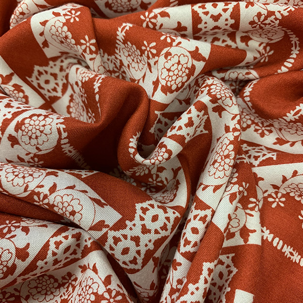 Red and White Lace Look Print Rayon Challis Fabric
